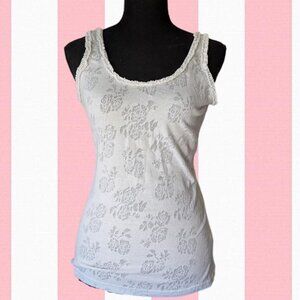 White floral lace tank top with ruffled trim on collar